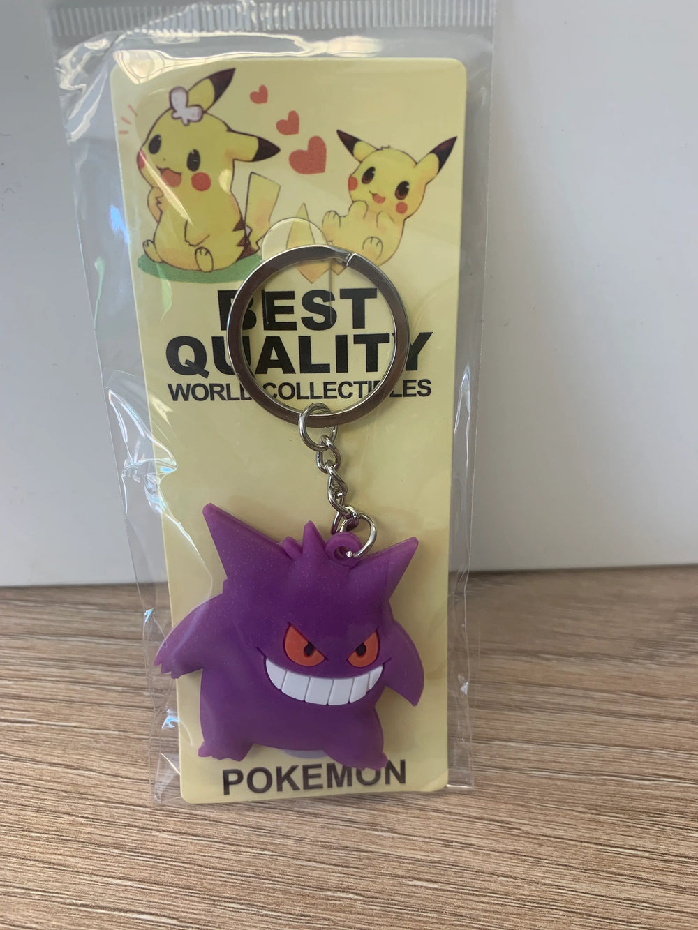 Porte-clés Pokémon Ectoplasma violet avec yeux orange et dents blanches en caoutchouc