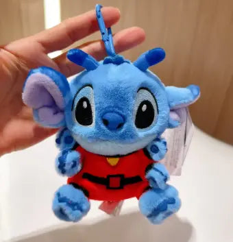 Peluche Stitch bleu 15 cm en tenue extraterrestre Expérience 626 avec gilet rouge et ceinture noire