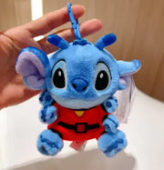 Peluche Stitch bleu 15 cm en tenue extraterrestre Expérience 626 avec gilet rouge et ceinture noire