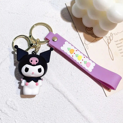 Porte-clés Hello Kitty Kuromi en bonnet noir silicone violet figurine noir et blanc