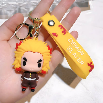Porte-clés Demon Slayer Kyōjurō Rengoku jaune caoutchouc chibi flammes