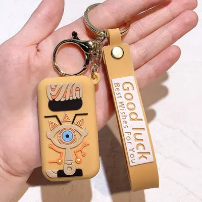 Porte-Clés The Legend of Zelda - Tablette du Sheikah Jaune — dans le même univers que Figurine Zelda Majora's Mask