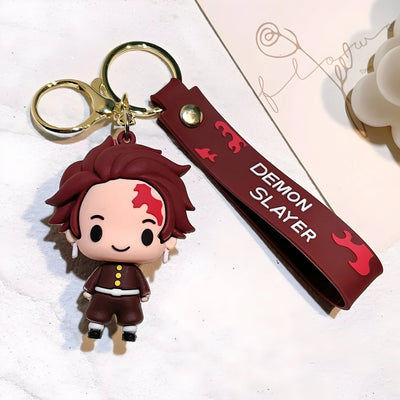 Porte-clés Demon Slayer Tanjirō Kamado chibi maroon et or