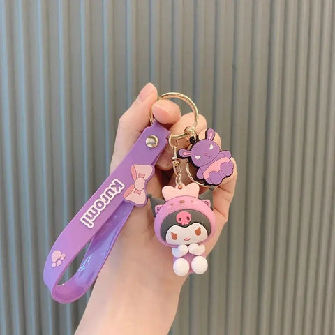 Porte-Clés Hello Kitty - Kuromi et son bonnet violet — dans le même univers que Peluche Hello Kitty Cosplay Ourson blanc - 20 cm