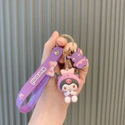 Porte-clés Hello Kitty Kuromi silicone violet avec sangle et patounes blanches