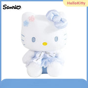 Peluche Hello Kitty 30 cm en tenue bleu clair avec nœud satin bleu