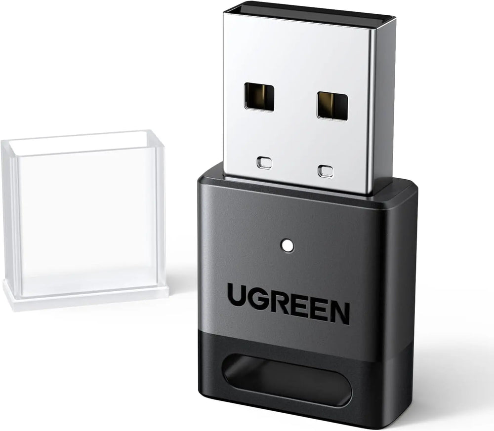 Clé Bluetooth Ugreen noire avec connecteur argenté et capuchon protecteur clair