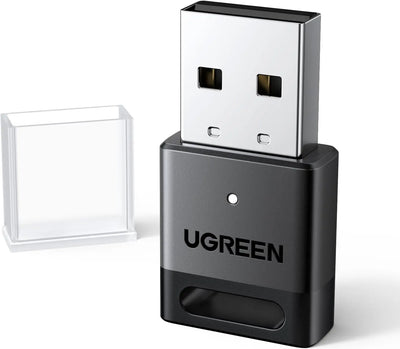 Clé Bluetooth Ugreen noire avec connecteur argenté et capuchon protecteur clair