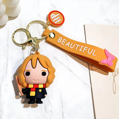 Porte-clés silicone orange Hermione Granger Harry Potter au foulard rouge et jaune