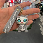 Porte-clés Disney Chat Cheshire POP gris et blanc yeux turquoise