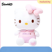 Peluche Hello Kitty 30 cm en combinaison rose avec hello et cœurs