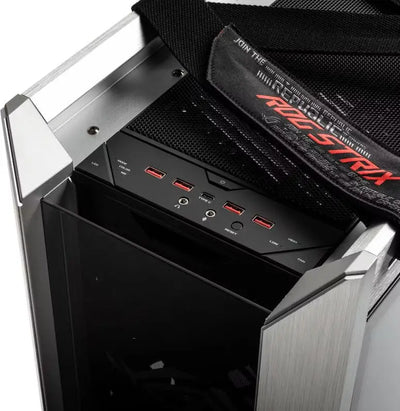 ASUS ROG Strix Helios RGB NOIR : boîtier PC gamer argent et noir avec ports USB rouge et sangle ROG
