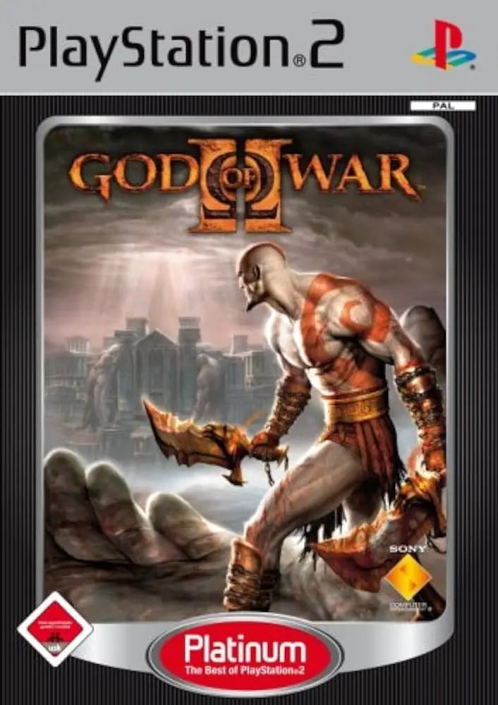 Coffret God of War II Platinum PS2 : guerrier musclé en armure rouge et or avec lame, fond mythologique sombre