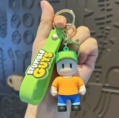 Porte-clés Stumble Guys Mr Stumble vert silicone avec pendentif orange