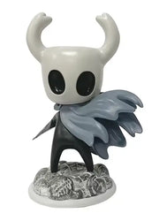 Figurine inspiree de Hollow Knight avec son emballage collector
