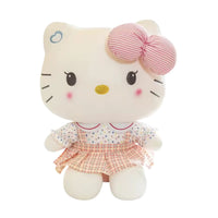 Peluche Hello Kitty 20 cm robe à carreaux beige pêche