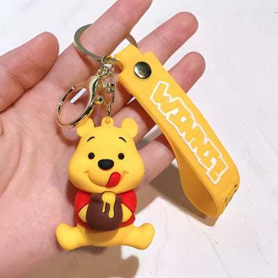 Porte clés Disney - Winnie l’Ourson avec son Pot de miel