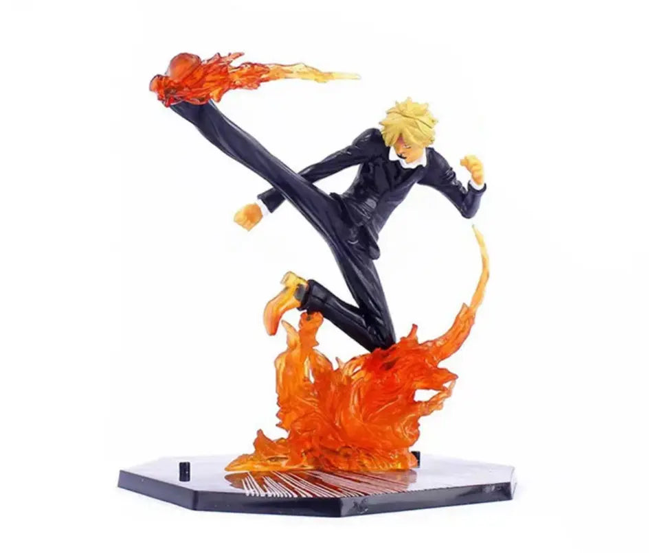 Figurine One Piece Sanji en costume noir, cheveux blonds, coup de pied au milieu de flammes orange translucides