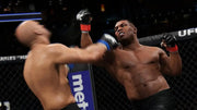 Gants UFC noirs avec wraps rouges et branding blanc pour UFC 2 PS4