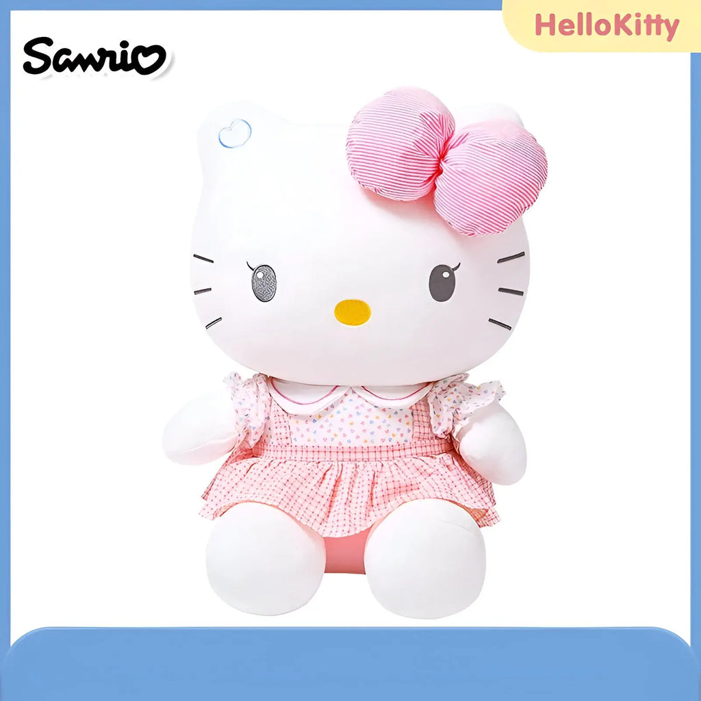Peluche Hello Kitty 30 cm en robe rose à pois, nœud rose rayé