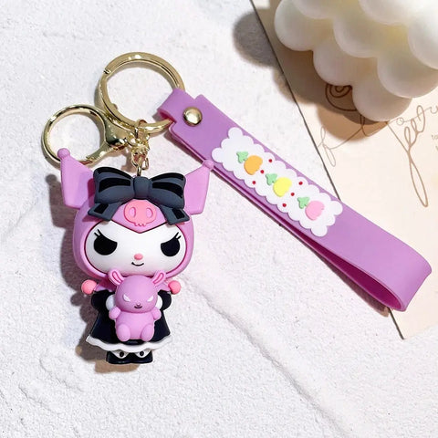 Porte-Clés Hello Kitty - Kuromi en robe noire et bonnet rose — dans le même univers que Peluche Hello Kitty Cosplay Ourson blanc - 20 cm