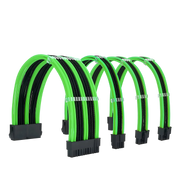 Ensemble de quatre câbles d’alimentation gainés vert vif et noir avec connecteurs renforcés.