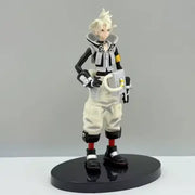 Figurine Gachiakuta Rudo : figure blanche et noire blindée aux cheveux hérissés sur socle circulaire