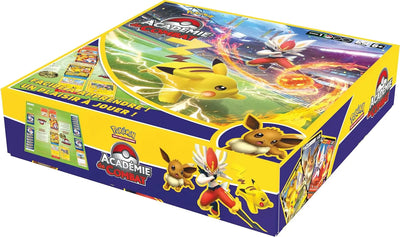 Boîte booster Pokémon Académie de Combat jaune et bleue avec Pikachu, Eevee et dresseur en action