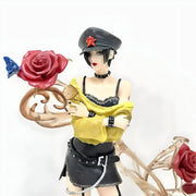 Figurine Nana Osaki 25 cm : Nana en noir et jaune avec casquette cuir étoile rouge