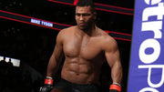 Rendu digital musclé torse nu de Mike Tyson en short noir et gants rouge-noir pour UFC 2 PS4