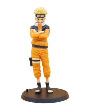 Figurine Naruto Uzumaki orange et bleu, bras croisés, cheveux blonds en pics