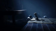 Scène sombre et atmosphérique de Little Nightmares II sur PS5