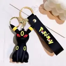 Porte-clés Pokémon Noctali noir avec accents jaunes et sangle logo Pokémon