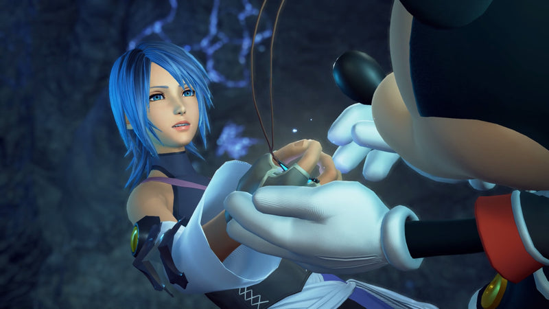 Aqua et le roi Mickey dans Kingdom Hearts Collection I-III